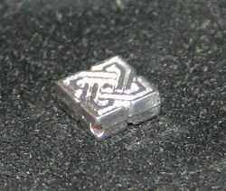 572114a Schmuckelement keltischer Knoten 10x3mm versilbert