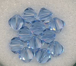530106444 Swarovski Glasschliffperlen 6mm light safir 12 Stück
