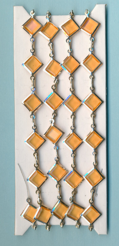 8651234 Acrylornamente Kette 50 Ornamente orange 1m