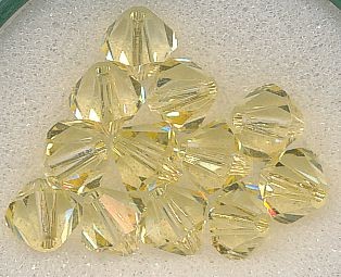 530106094 Swarovski Perlen 6mm jonquil 12 Stück in Dose