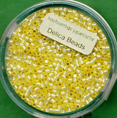 9663024_Delica-Beads-2mm-gelb-alabaster-Silbereinzug-9g