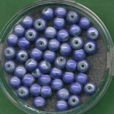 073304884 Miracle Beads 4mm tanzanite 50 Stück