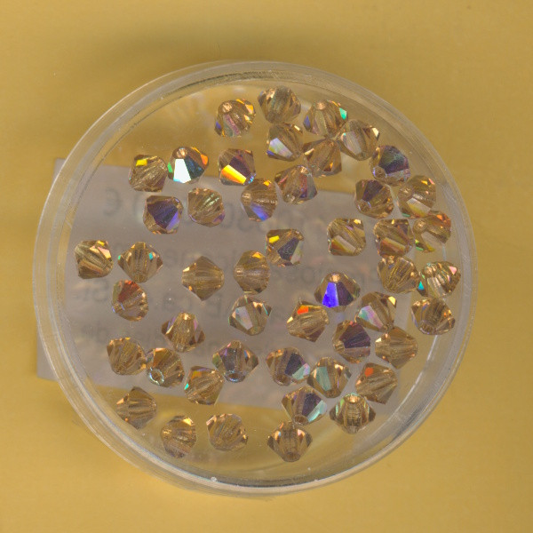 pc410330 Preciosa Bicone 4mm light topas AB 48 Stück