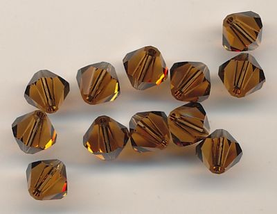 530106204 Swarovski Glasschliffperlen 6mm smoked topas 12 Stück