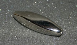 Metallperle oval gedreht silber 40x20mm