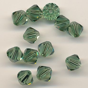 14281429 Swarovski Kristallschliffperlen 6mm smaragd 12 Stück