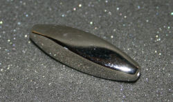 66400125 Metallperle oval gedreht silber 40x20mm